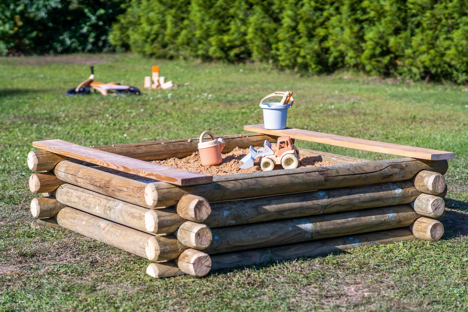 Sandkasten aus Holz